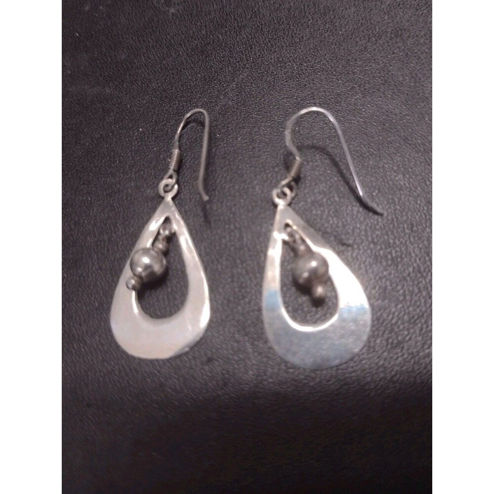 Sterling Silver Teardrop Shaped Dangling Earrings